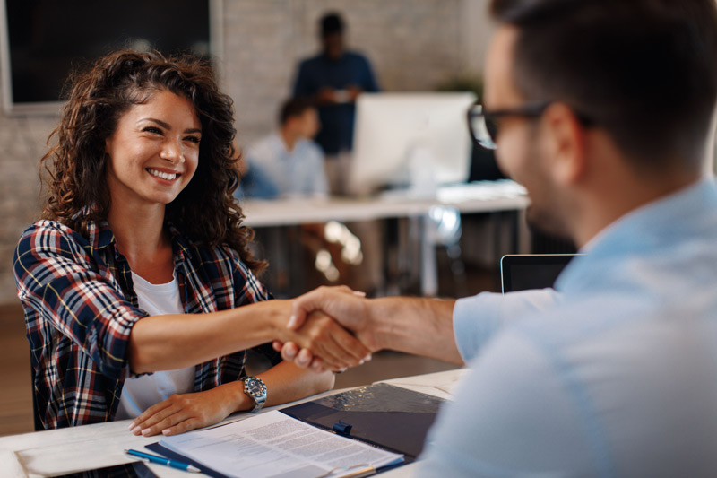 two people shaking hands