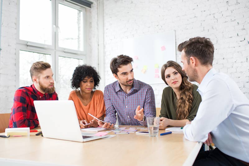 Office colleagues discussing